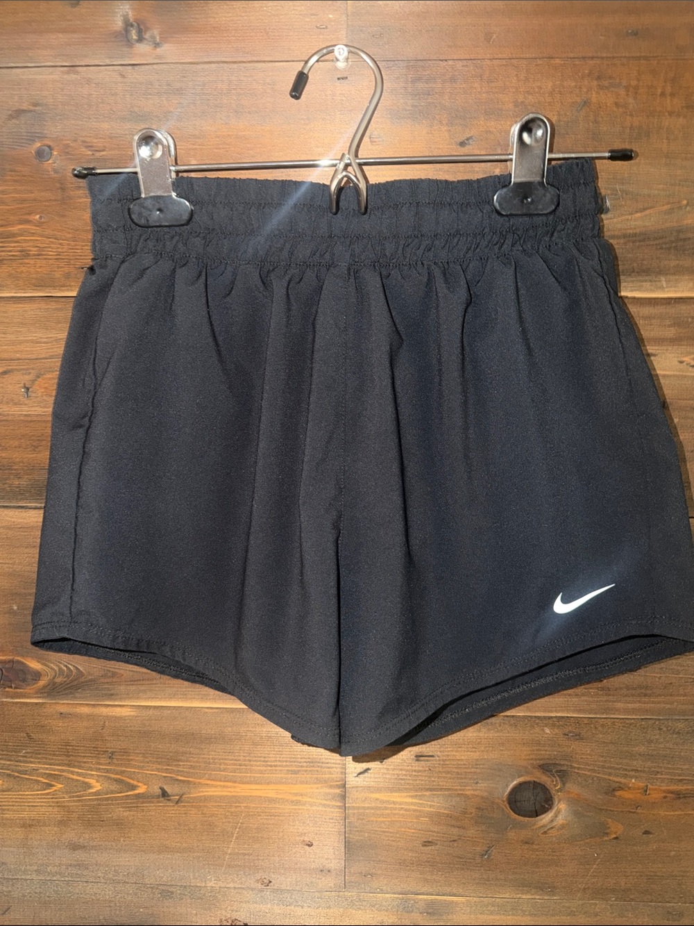 Nike Girls Black Athletic Shorts with White Swoosh